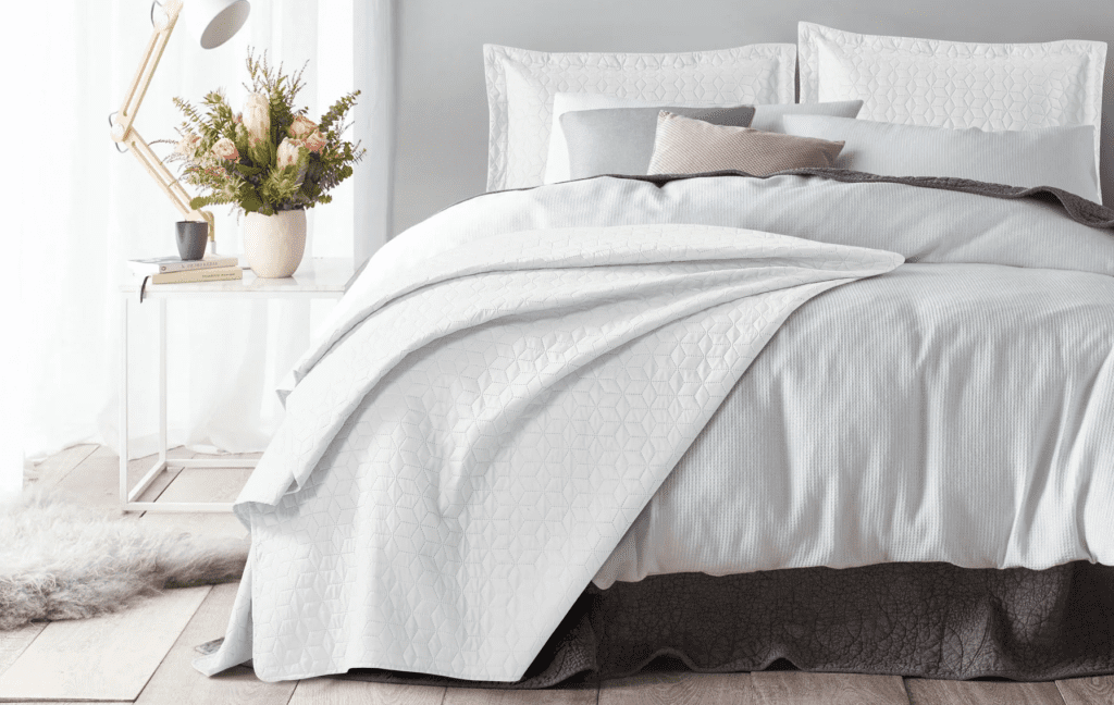 Wayfair - Beroligende sengetæppe i neutral farve